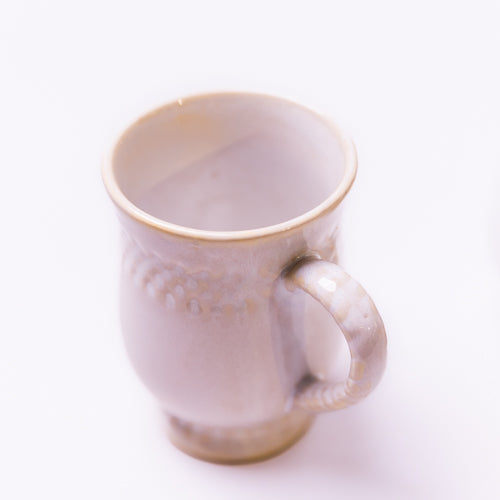 Off White Embossed Ceramic Mug