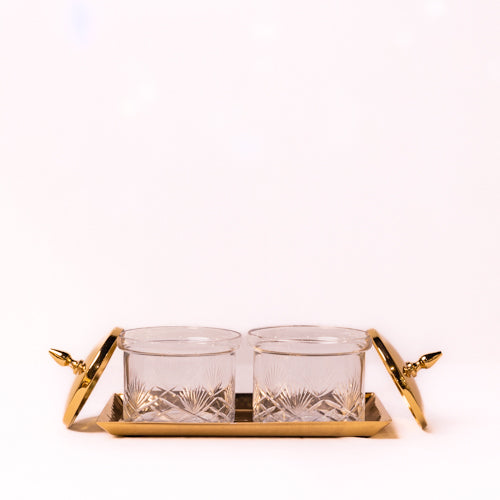 Set Of 2 Glass Jars With A Lid On A Metal Tray