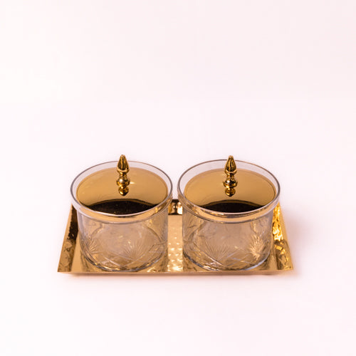 Set Of 2 Glass Jars With A Lid On A Metal Tray